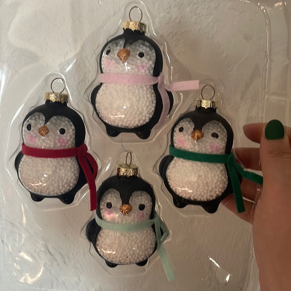4 gently used penguins glitter ornaments